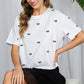 SHORT SLEEVE BOW EMBROIDERED COTTON TOP